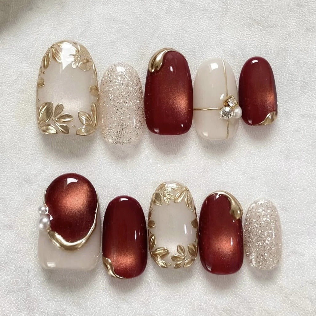 Artificial nails with elegant gold accent Stornfield