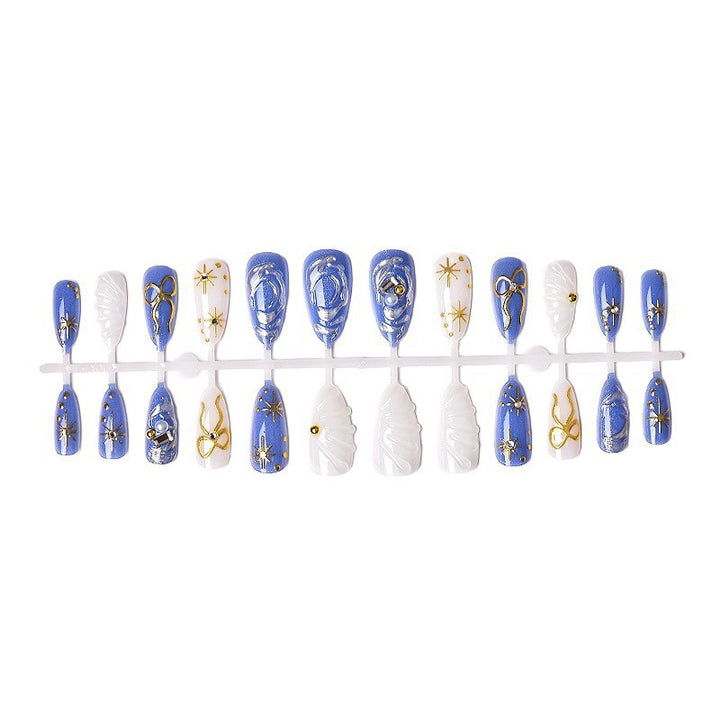 Acrylic nail set with glamorous golden accents Stornfield