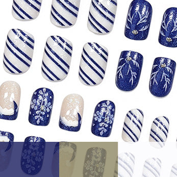 Artistic Winter-Themed Acrylic Nail Art Enhancements Stornfield