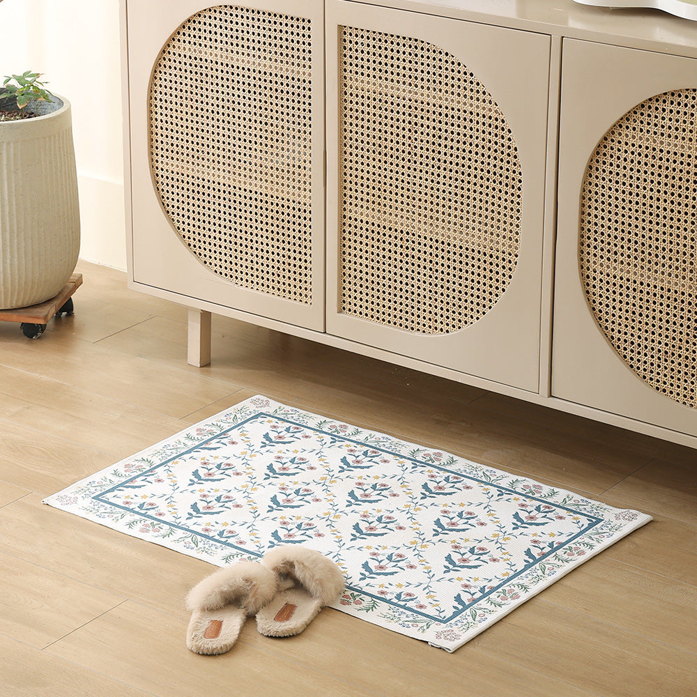 Woven cotton bath mat with floral allover jacquard pattern Stornfield