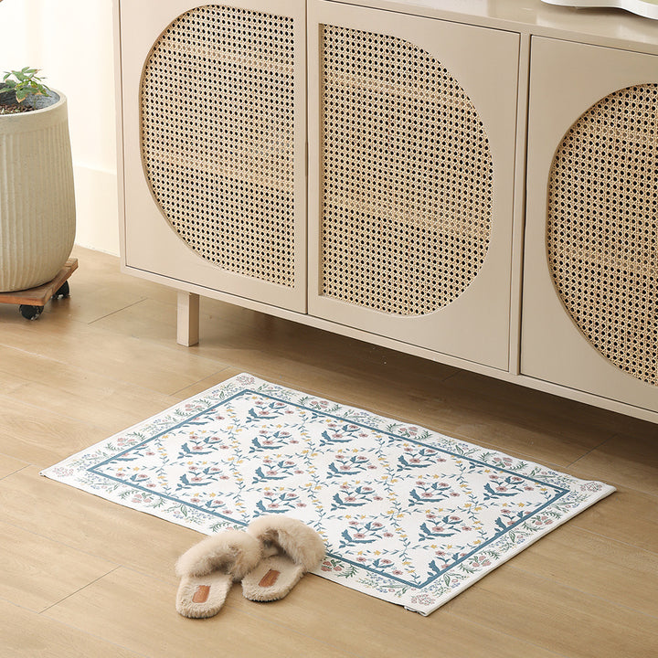 Woven cotton bath mat with floral allover jacquard pattern Stornfield