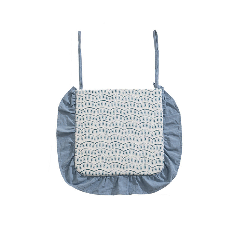Padded chair seat cushion with tie straps and ruffled edge