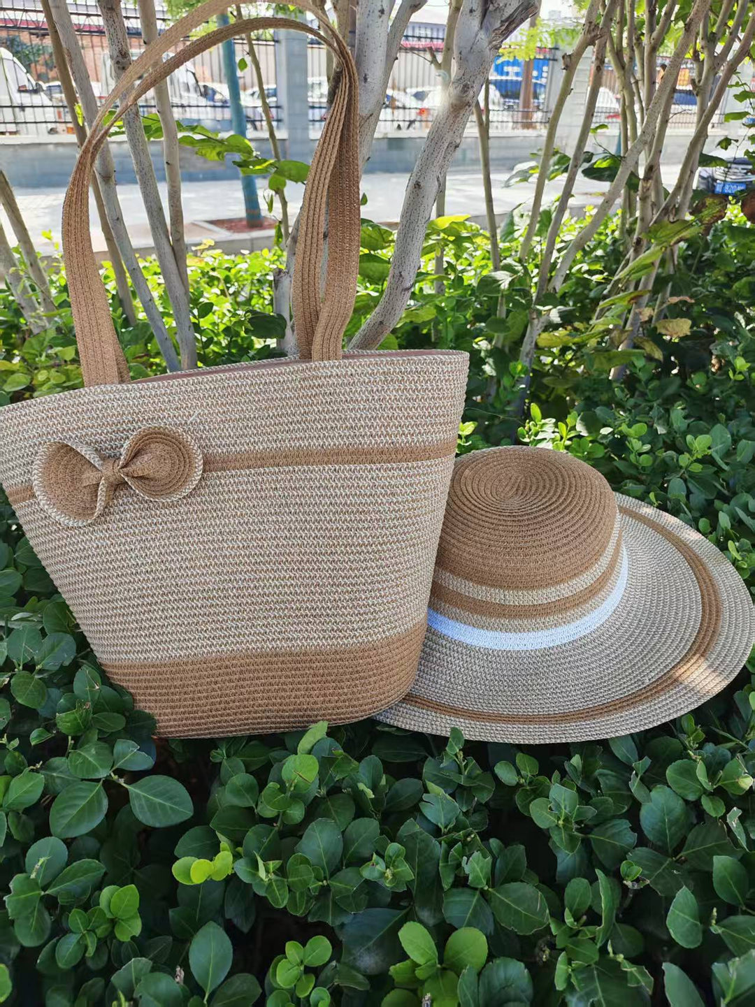 Elegant sun hat with wide brim and subtle stripe pattern Stornfield
