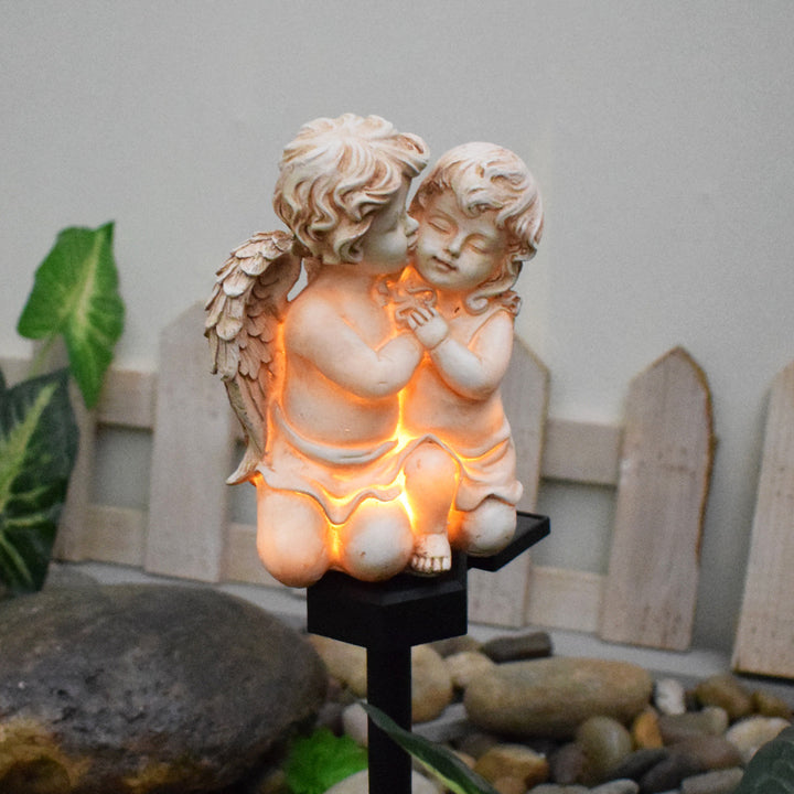 Decorative Solar Garden Stake Statue Resin Girl Figurine With Integrated Solar LED And Weatherproof Spike Stornfield