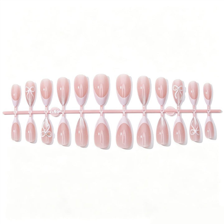 Artificial nail set with elegant tips and glitter accents Stornfield