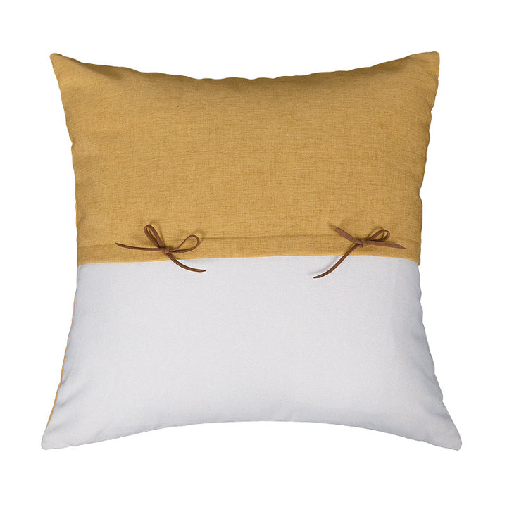Square decorative cushion cover made of cotton blend with handwoven texture, geometric diamond print, and corner tassels