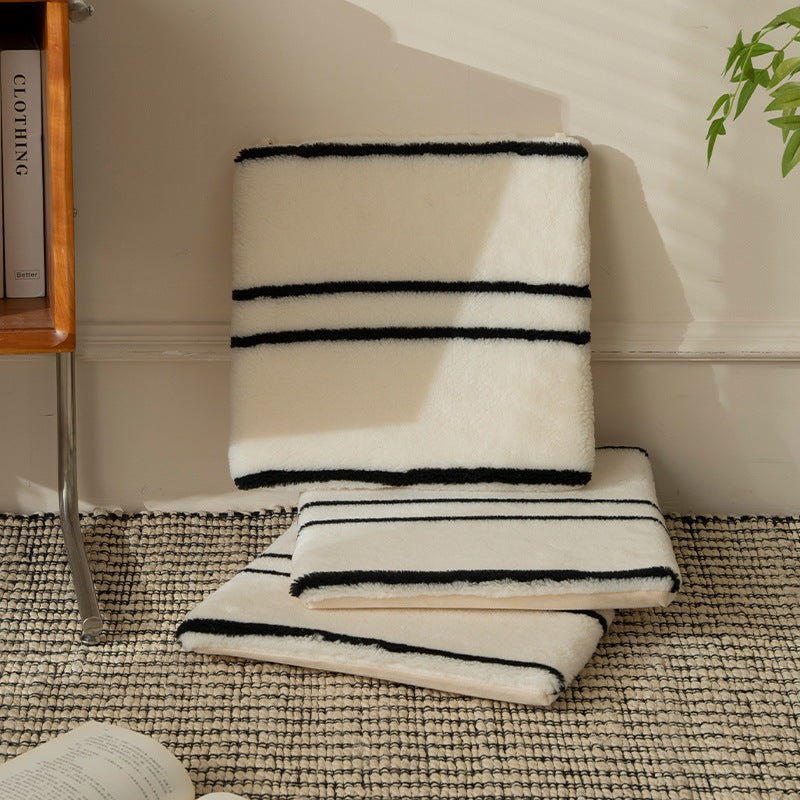 Reversible seat cushion made of teddy plush with non-slip bottom and contrast stripes Stornfield