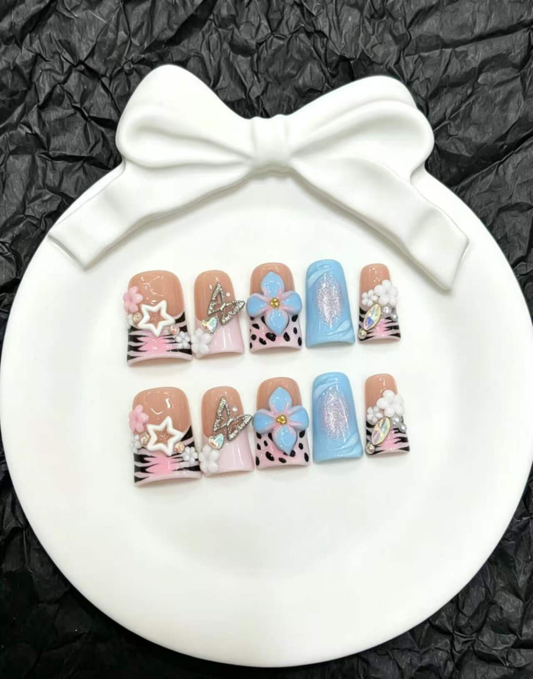 Artistic Nail Art Press-On Set with Floral and Gem Accents