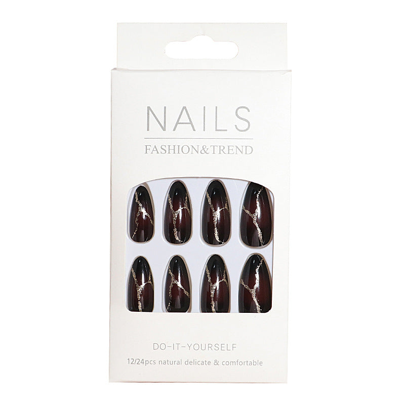 Artistic Press-On Nail Design with Gold Veining Accents Stornfield