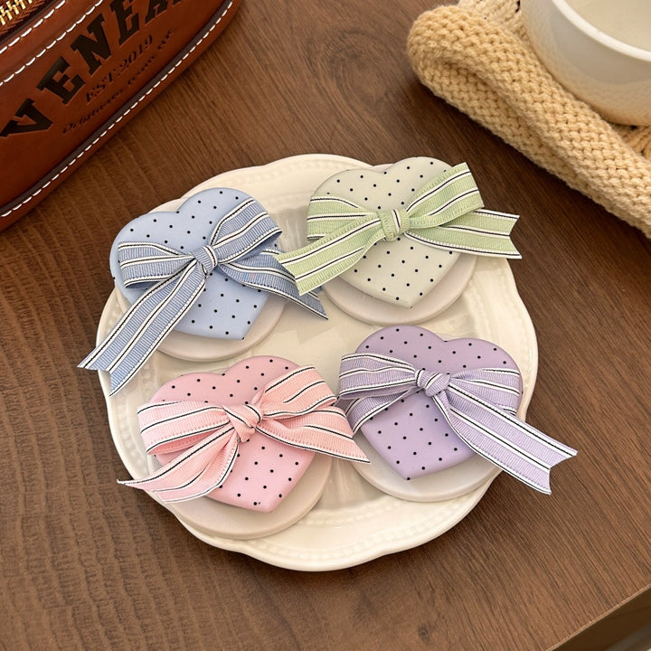 Heart-shaped cosmetic box with bow motif Stornfield