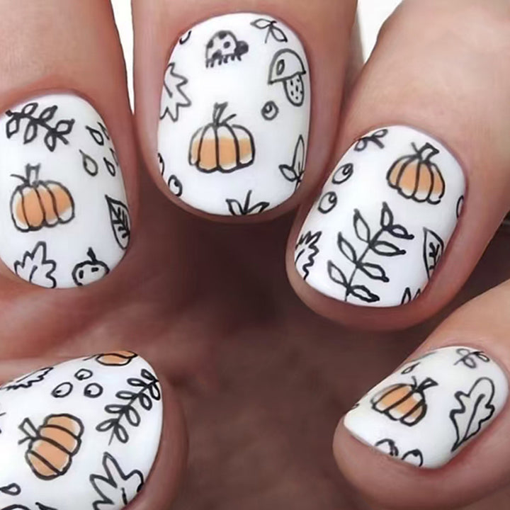 Seasonal Pumpkin-Themed Nail Art Stornfield