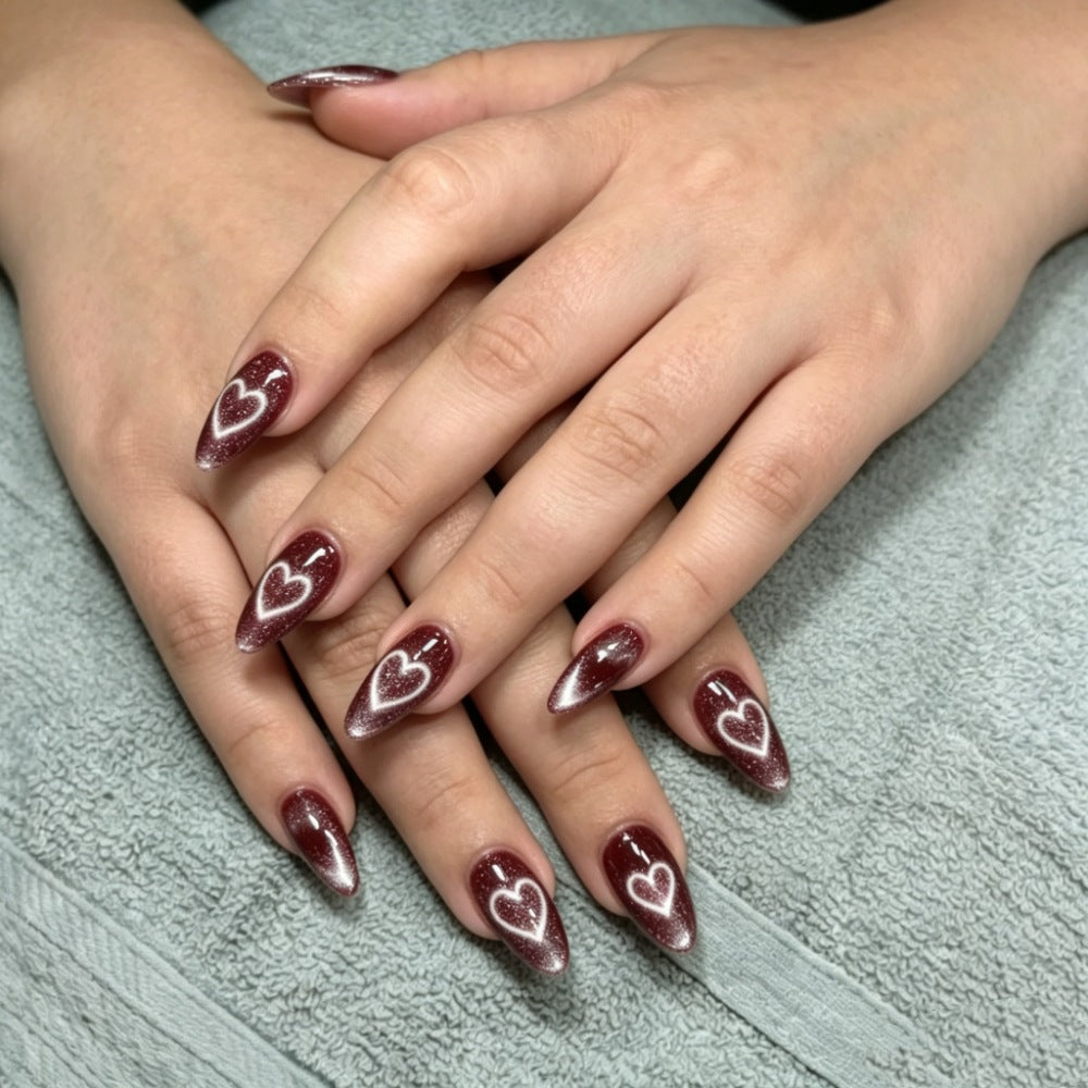 Artificial nails with luxurious heart design and shimmering finish Stornfield