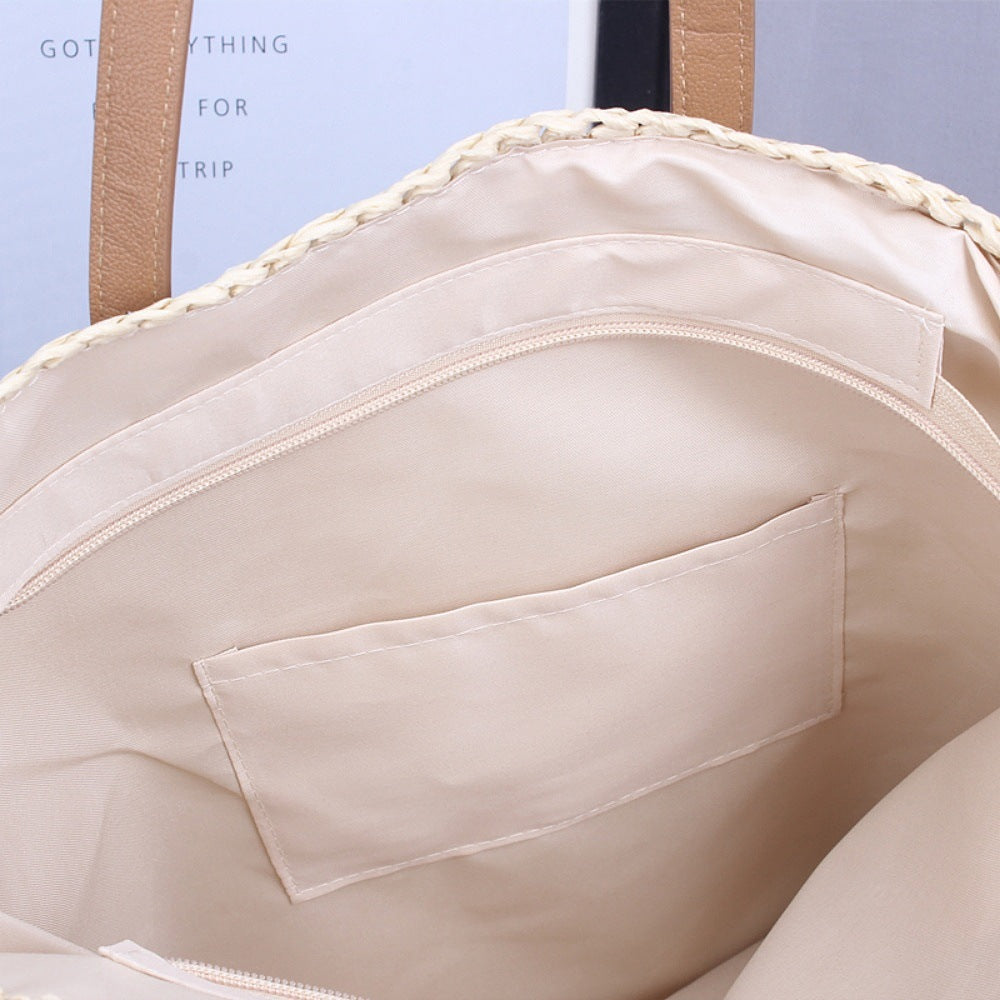 Handwoven beach bag made of natural materials with leather accents Stornfield