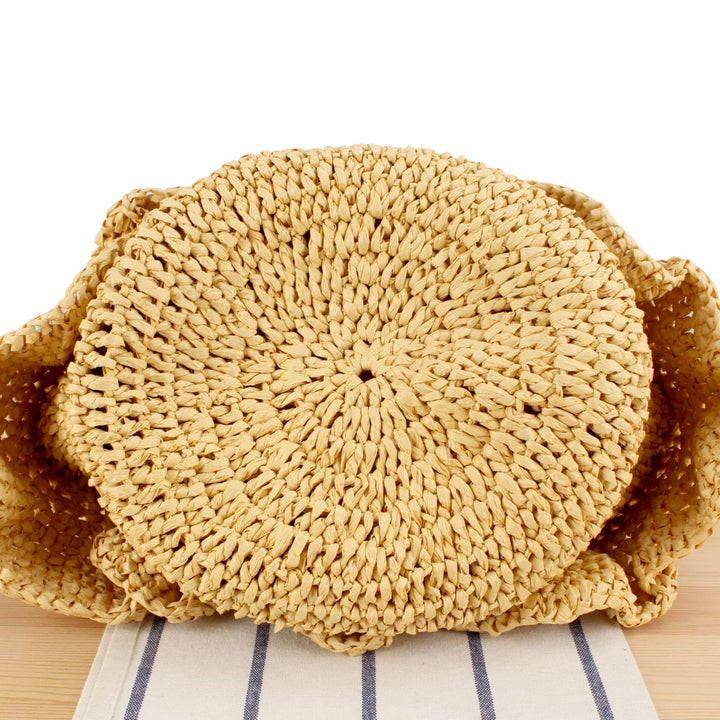 Braided backpack bag with stylish ruffle details Stornfield