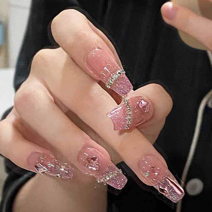 Glamorous artificial nails with moon and star motif Stornfield