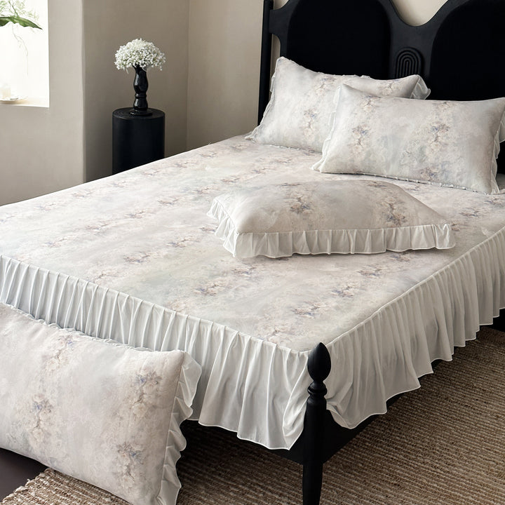 Luxurious bedding set with ruffled hem, fitted sheet and pillowcases