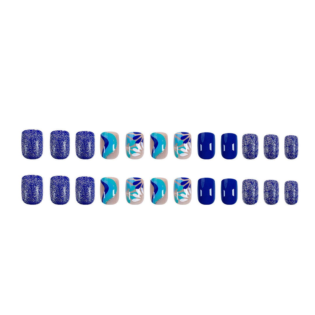 Artful nail design with floral and geometric patterns Stornfield