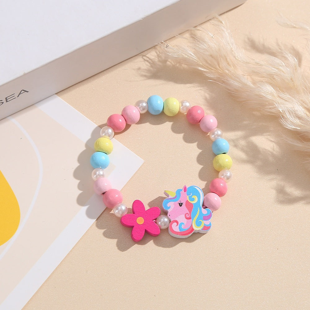Playful children's bracelet with unicorn and flower motif Stornfield