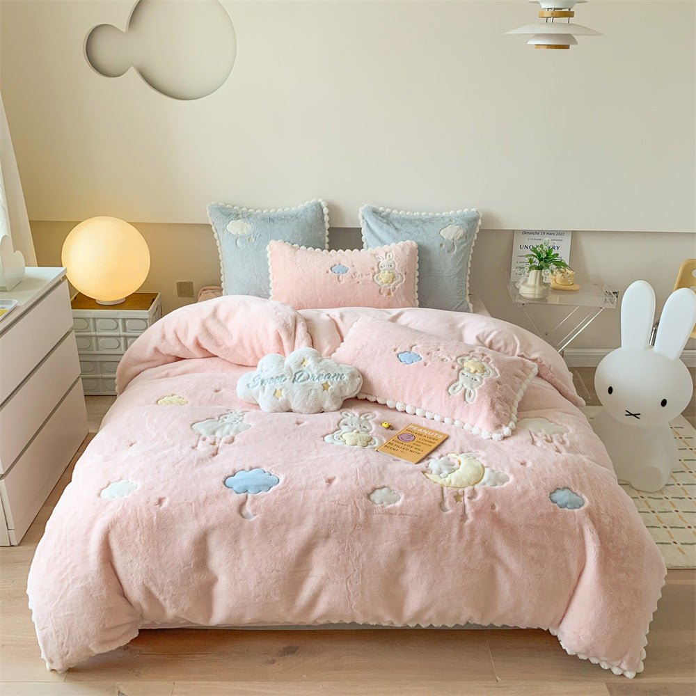 Cozy velvet bedding set for children with embroidered cloud motifs and pompom border