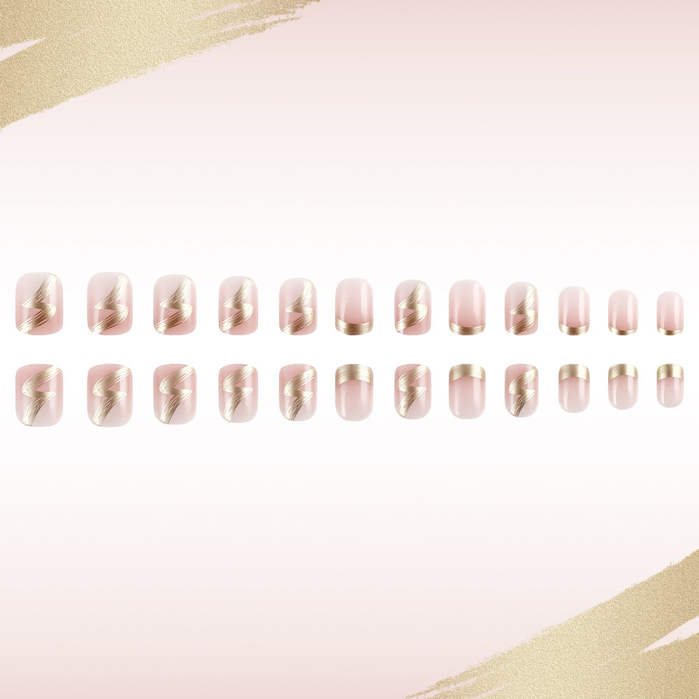 Elegant French Tip Press-On Nails with Gold Accents Stornfield