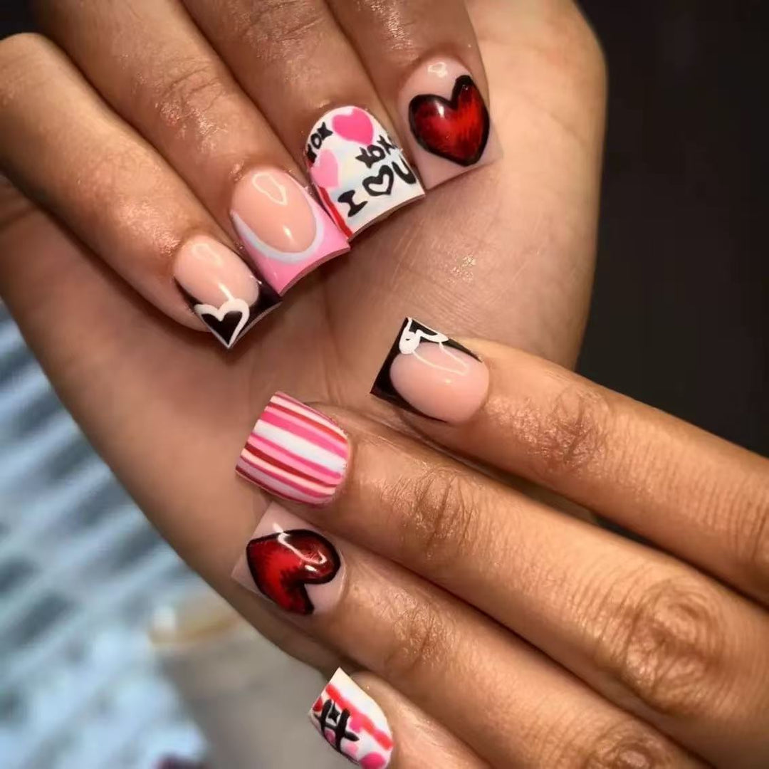 Artificial nail set with romantic heart and stripe designs Stornfield