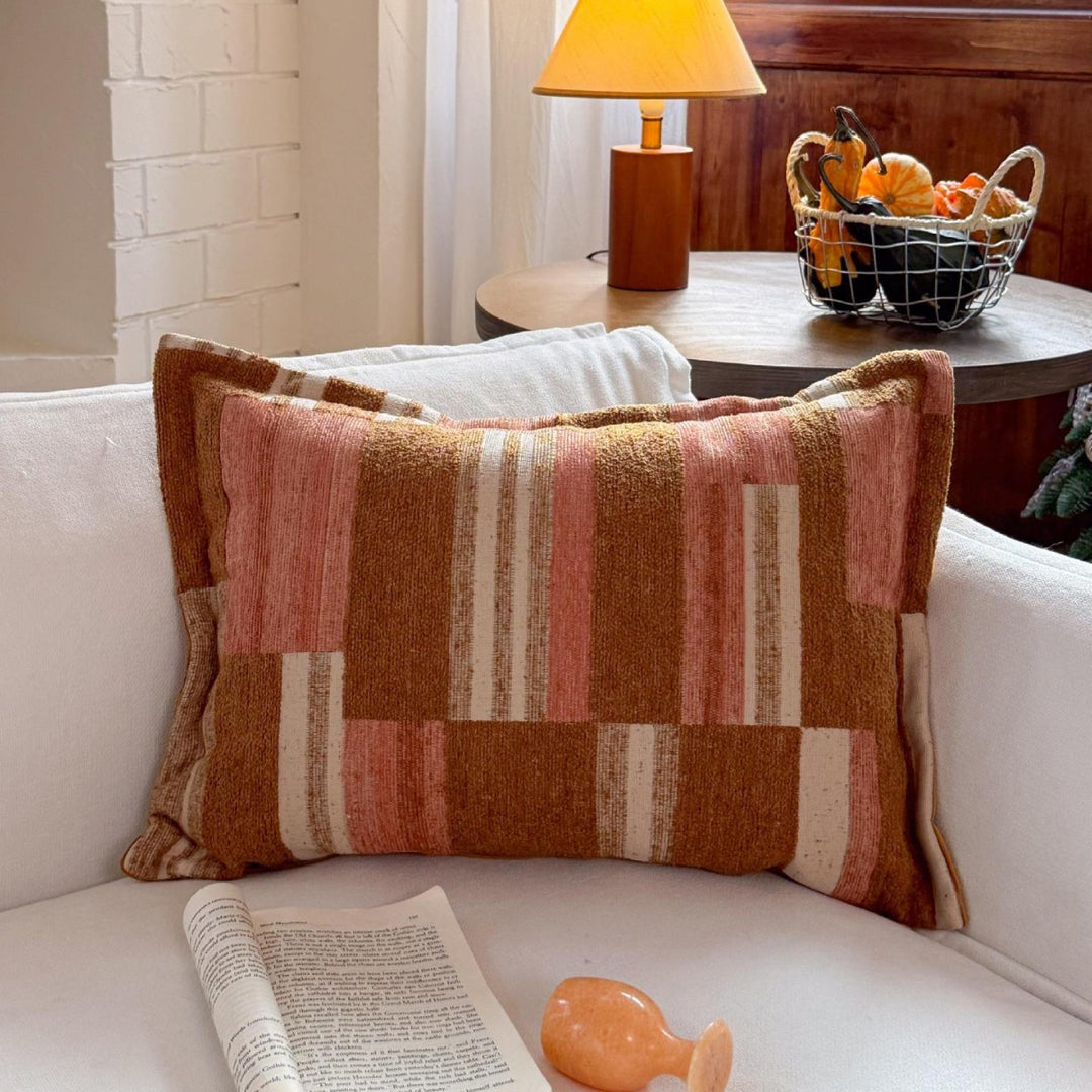 Decorative cushion made of linen look with hand-tied fringes and cross-stitch detail