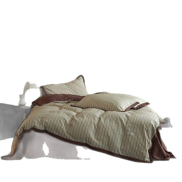 Luxurious cotton bedding set with ruffled trim and pillowcases