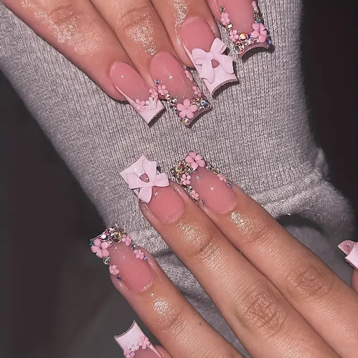 Art nail set with floral 3D accents and glitter decorations Stornfield
