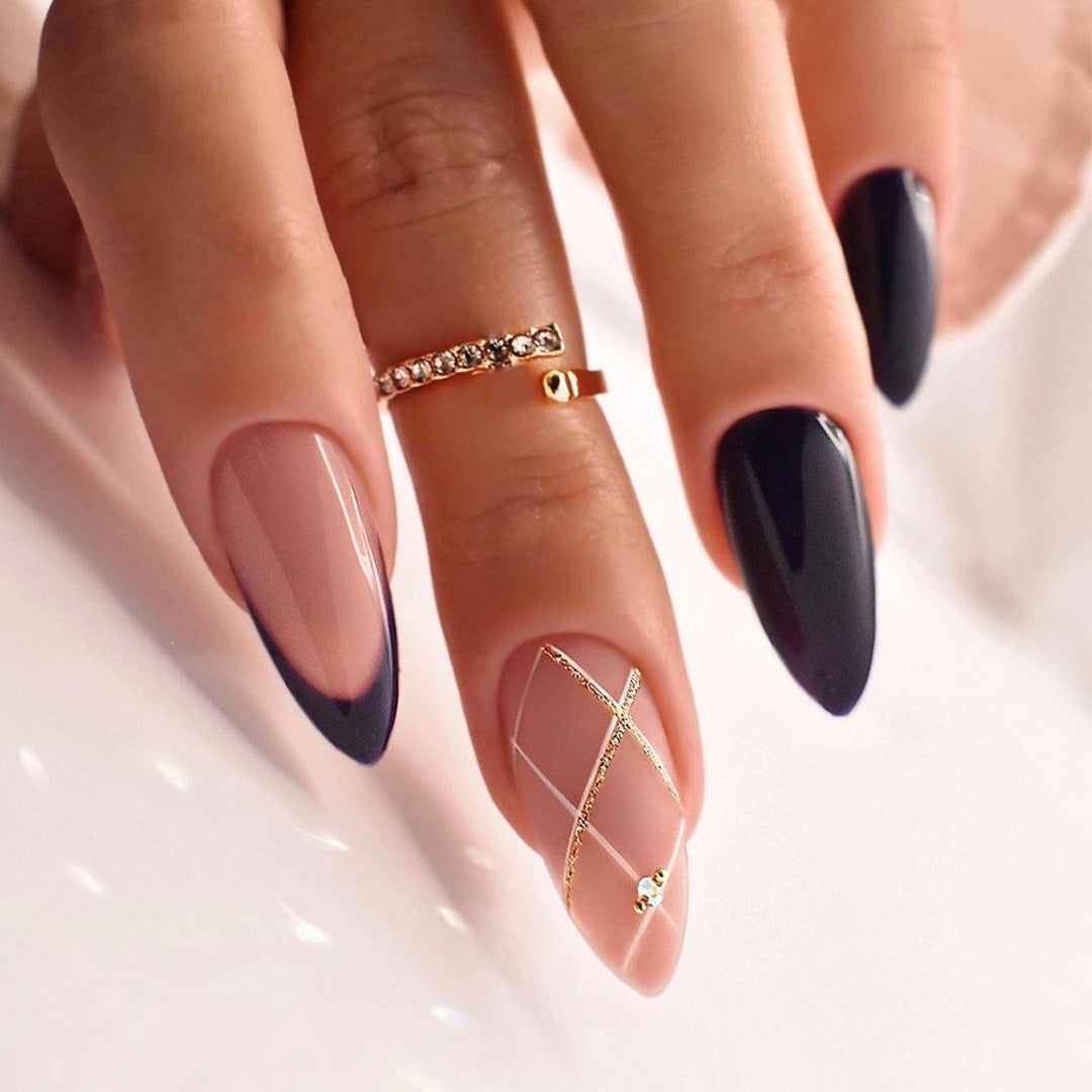 Artificial nail creation with glamorous tips and glitter details Stornfield