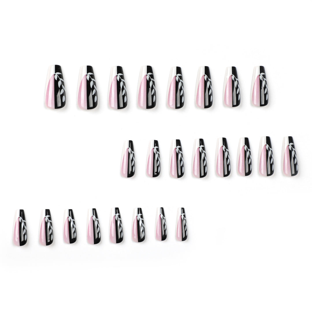 Artful nail extensions in elegant black and white design Stornfield