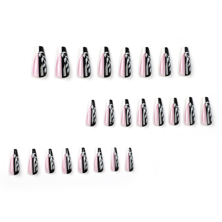 Artful nail extensions in elegant black and white design Stornfield