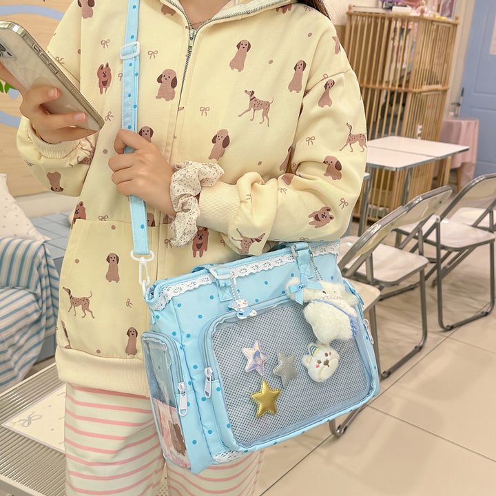Handbag with Transparent Compartment Division and Playful Application Design Stornfield