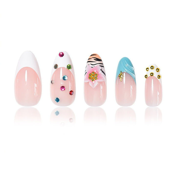 Artistic Stiletto Nail Enhancements with Unique Emblem Accents Stornfield