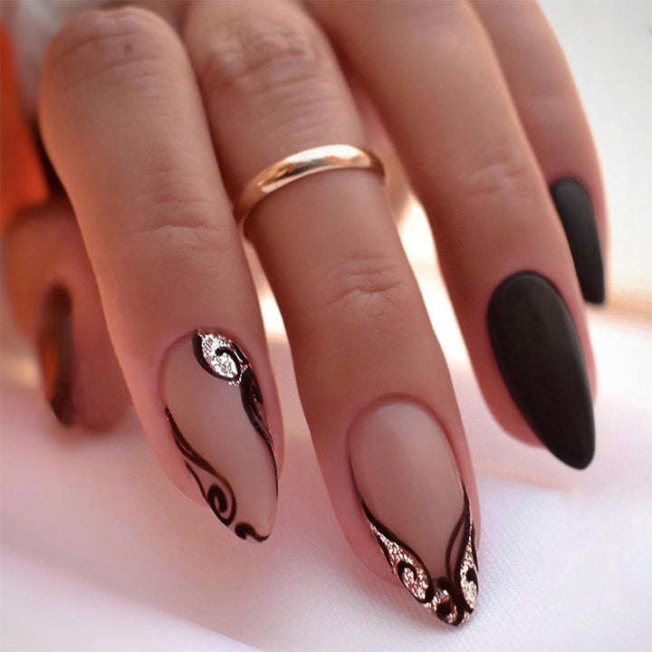 Creative nail art set with exquisite marbled designs and elegant accents Stornfield