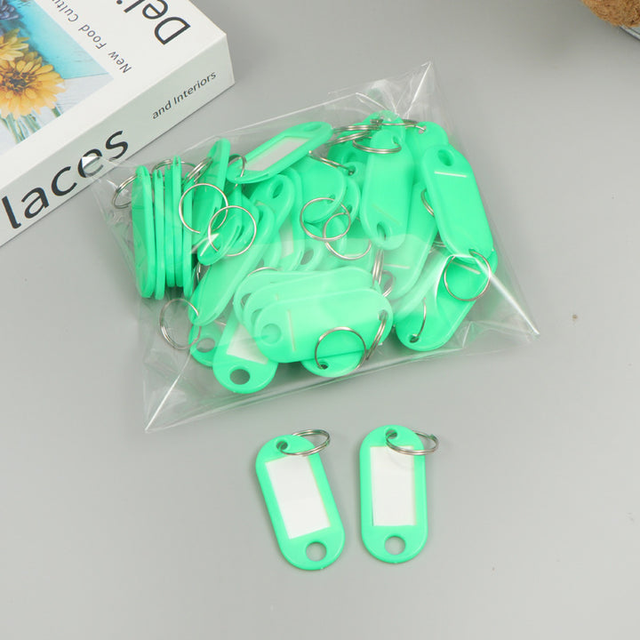 Unisex writable keychain with clear labeling field Kalsten