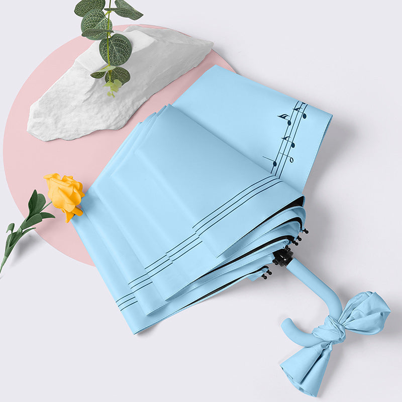 Ladies elegant folding umbrella with heart-shaped design Stornfield