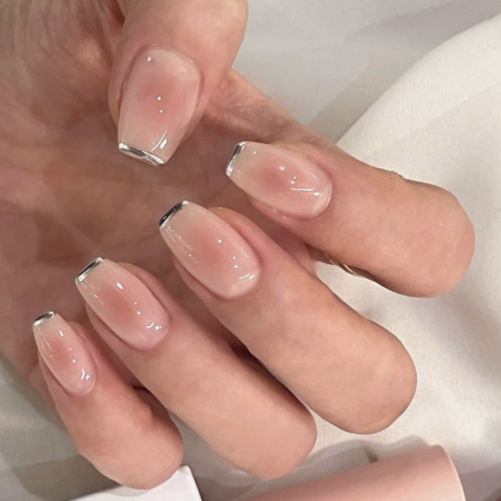 Elegant Nail Extensions with Translucent French Tip Stornfield