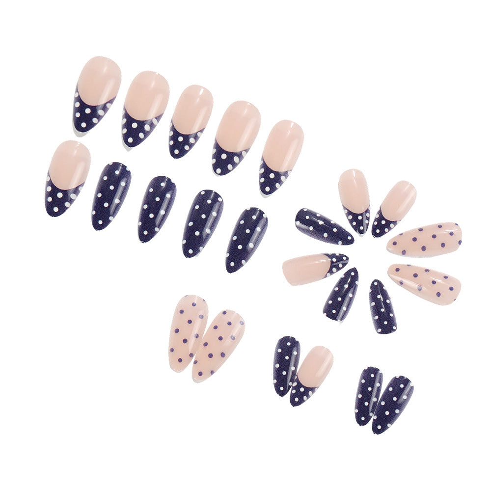 Artificial nails in modern polka dot design Stornfield
