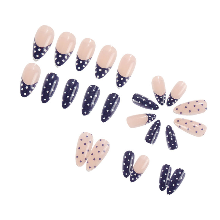 Artificial nails in modern polka dot design Stornfield