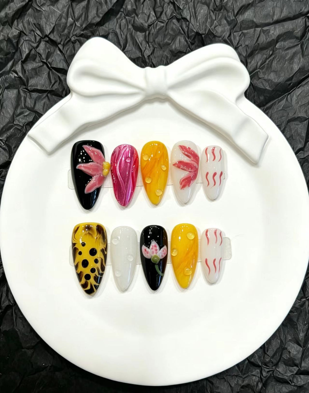 Decorative Press-On Nail Art Set with Floral and Whimsical Designs