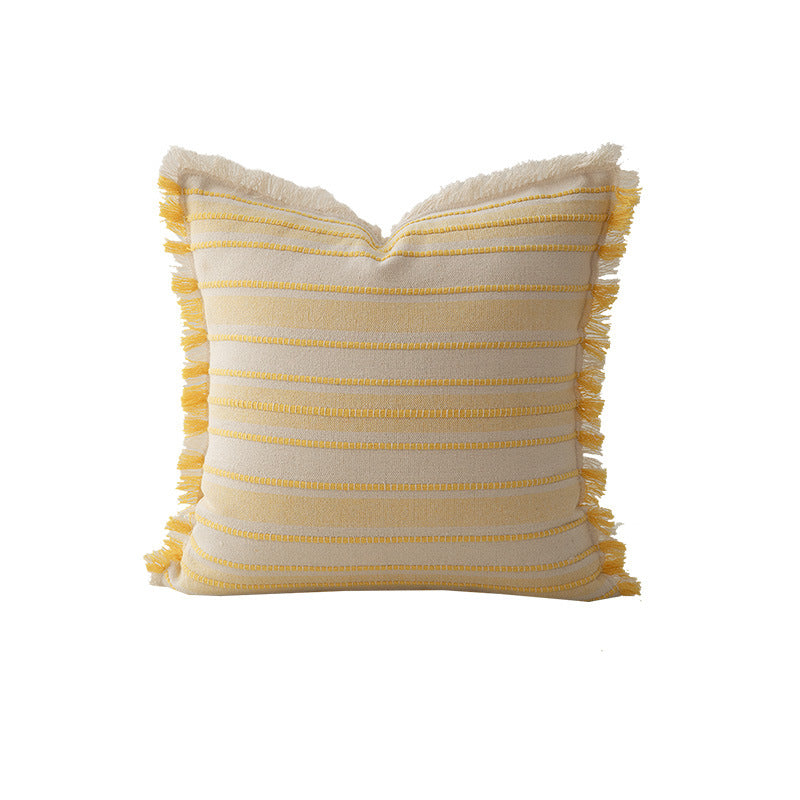 Square cushion cover made of hand-woven cotton blend with decorative fringe trim Stornfield