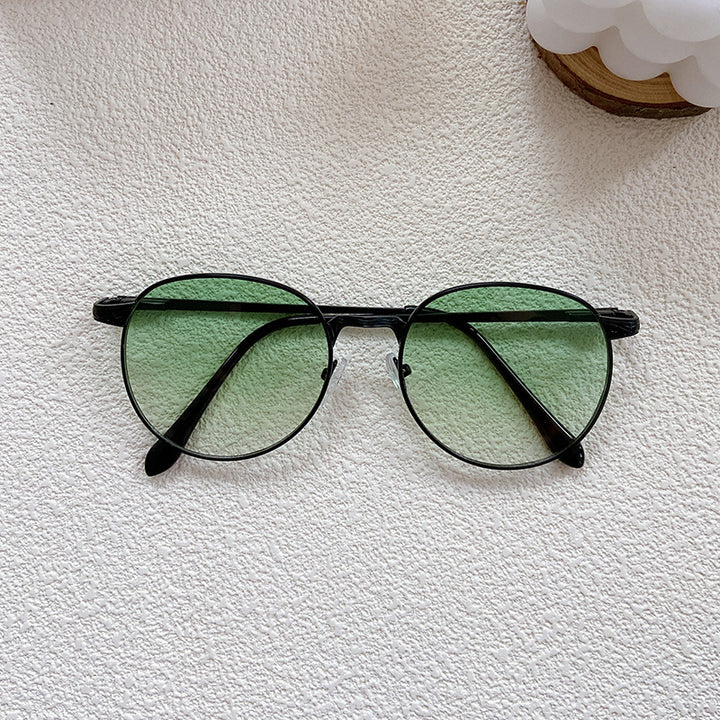 Fashionable sunglasses with round frame and intricate design Stornfield