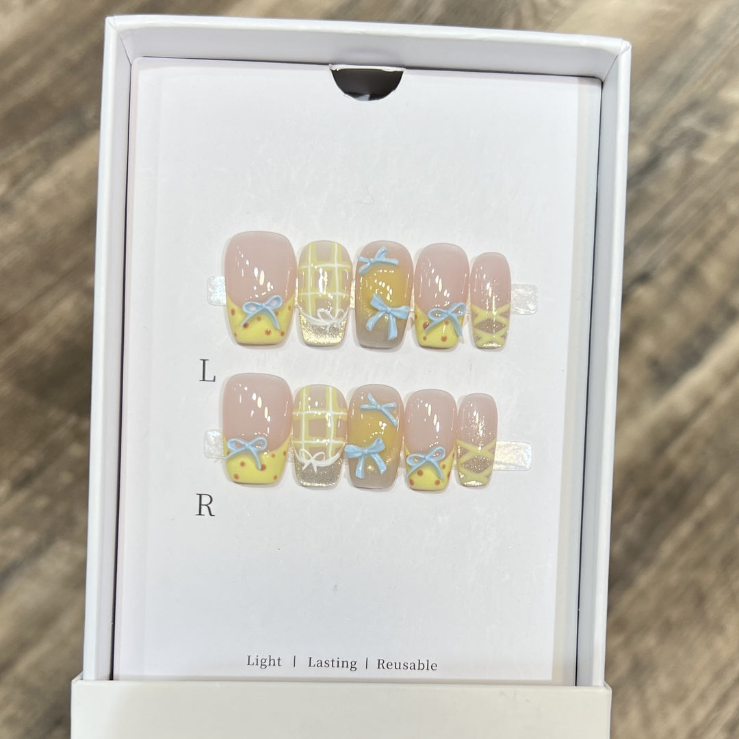Decorative Press-On Nail Art Set with Charming Bow and Pattern Designs Stornfield