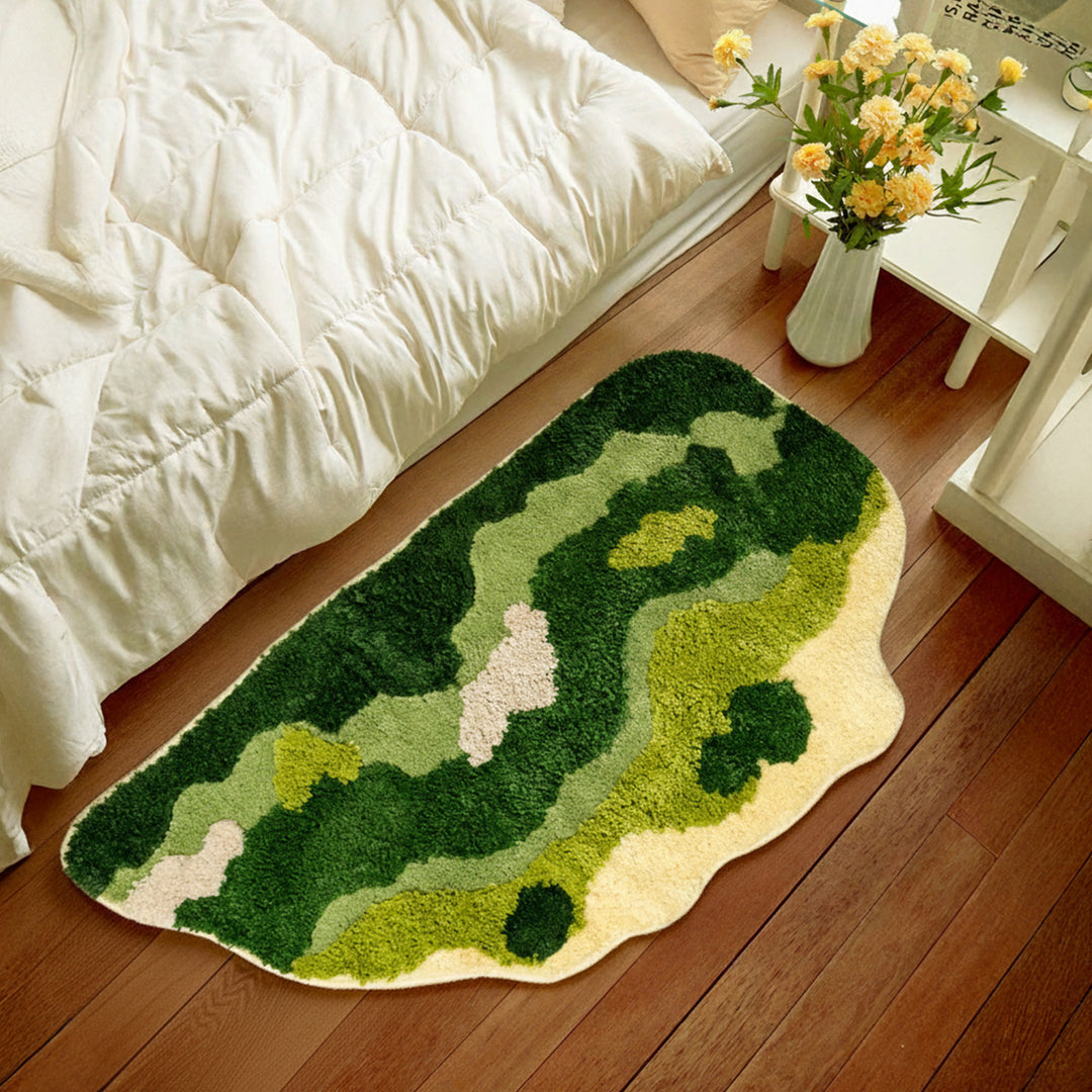 Shaped hand-tufted living room rug with moss-like structure and relief optics Stornfield