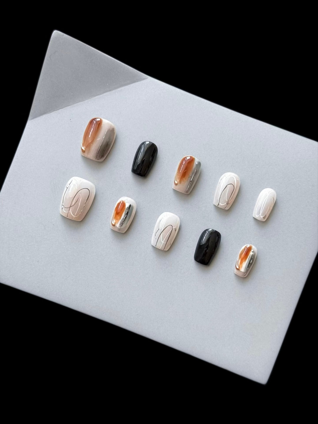 Artistic Press-On Nail Set with Marble and Glossy Finish