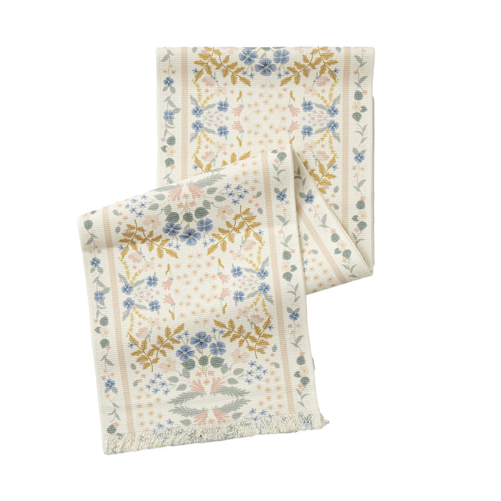 Woven runner with vintage-oriental floral pattern and fringes