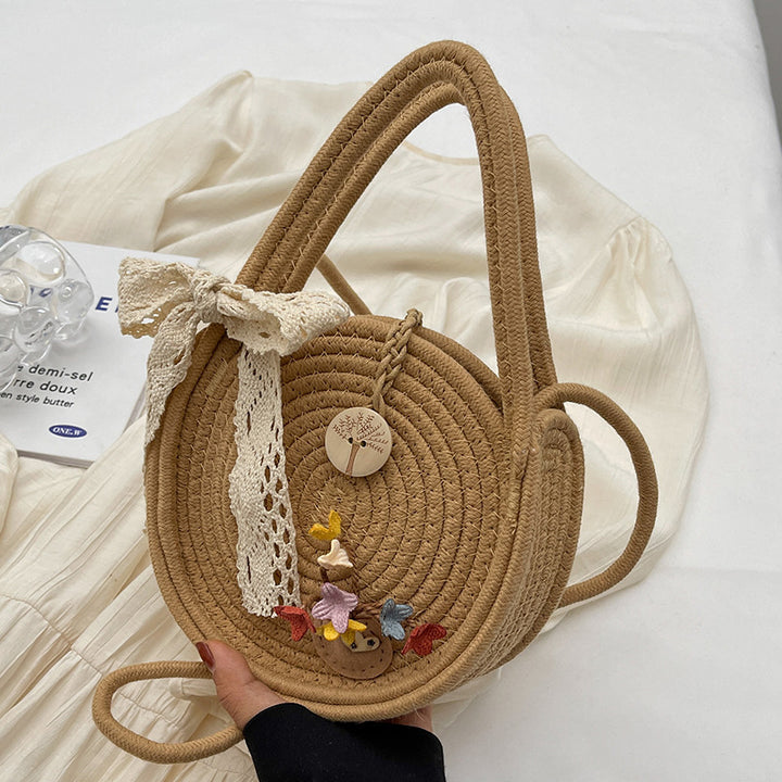 Handcrafted Floral Accent Straw Bag