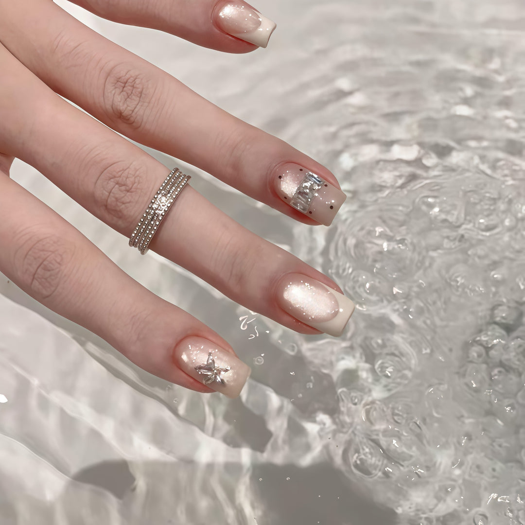 Elegant artificial nails with shimmer and glitter Stornfield