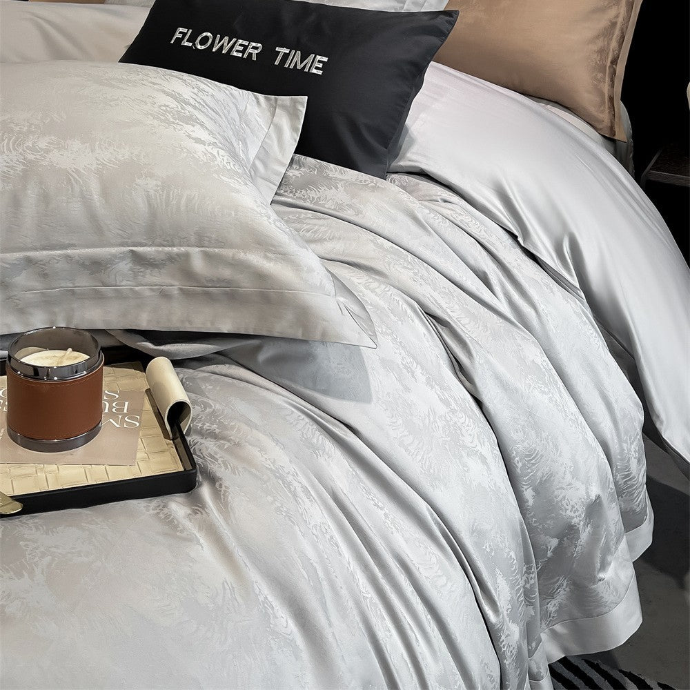 Luxurious cotton satin bedding set with jacquard relief and contrast piping