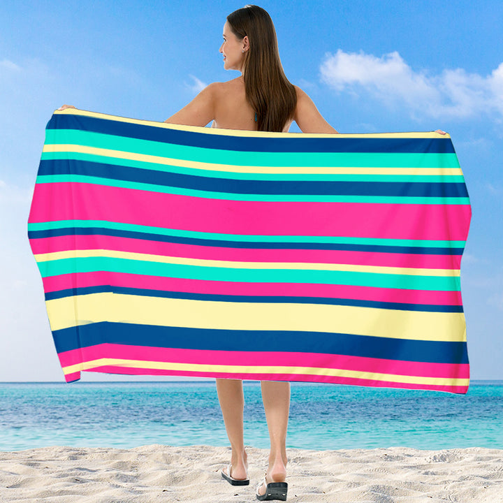 Beach towel with vibrant gradient color and stylish striped design Stornfield